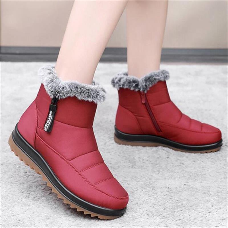 Winterfeindliche warme Baumwollstiefel der Frauen winterfest
