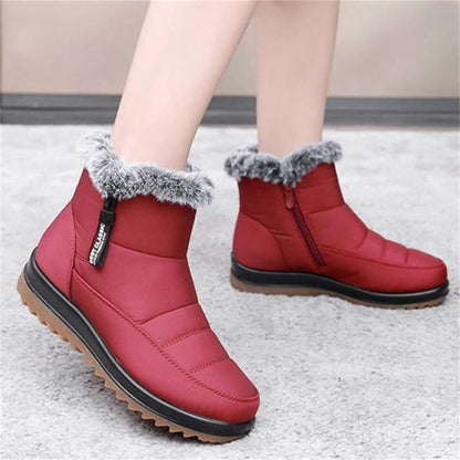Winterfeindliche warme Baumwollstiefel der Frauen winterfest