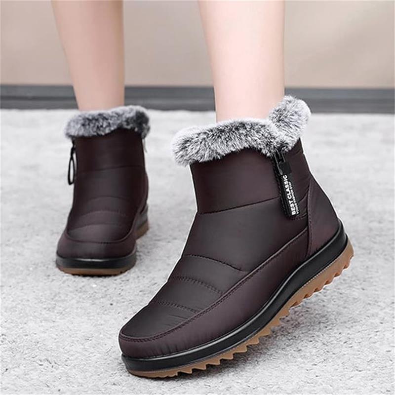 Winterfeindliche warme Baumwollstiefel der Frauen winterfest