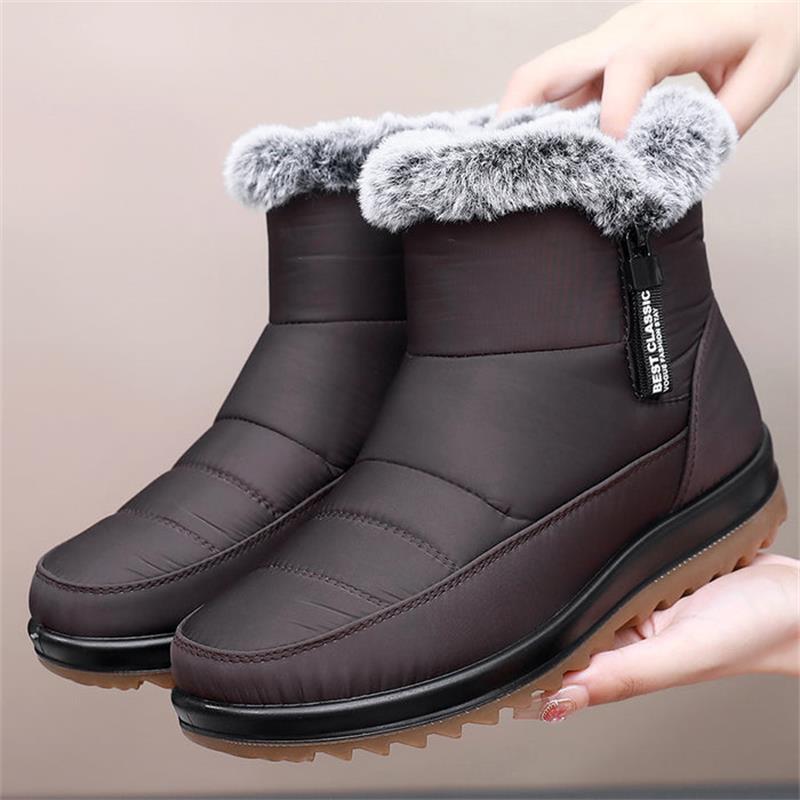 Winterfeindliche warme Baumwollstiefel der Frauen winterfest