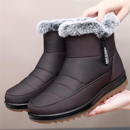 Winterfeindliche warme Baumwollstiefel der Frauen winterfest