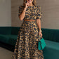 Elegantes Co-ord Set im Print-Design: Figurschmeichelndes Blusen-Top & weite Maxihose